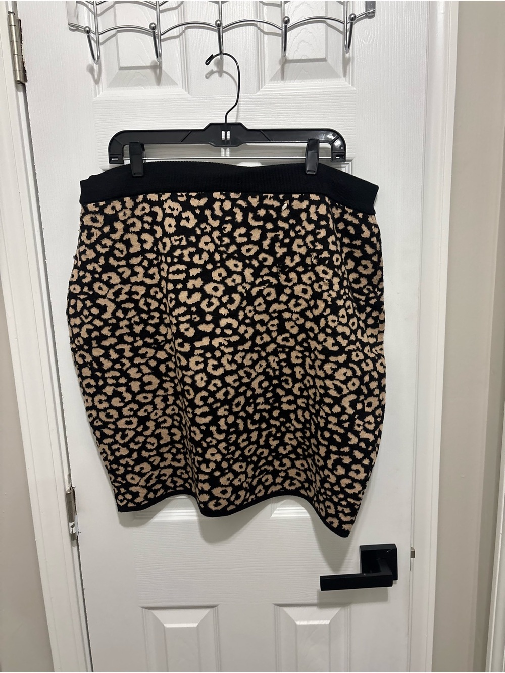 Soho Apparel Black and Tan Leopard Print Knit Mini Skirt